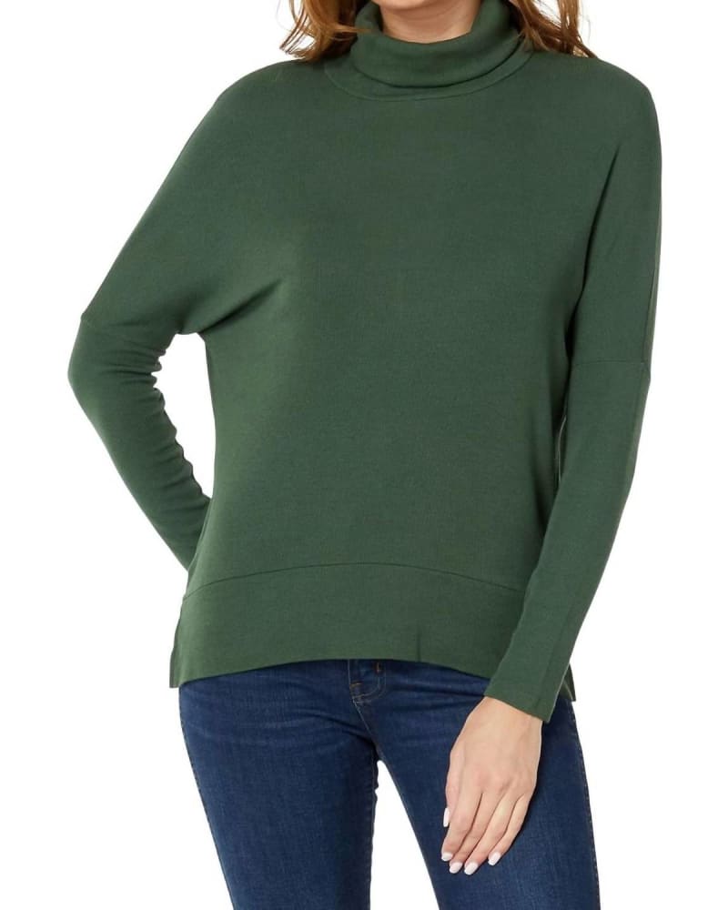 Front of a model wearing a size Large Split Hem Turtleneck Top in Ficus in Ficus by bobi. | dia_product_style_image_id:326337